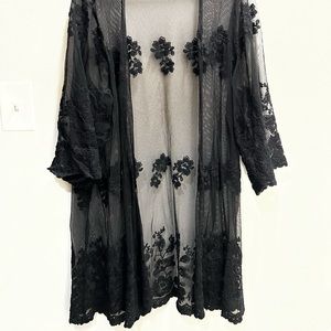 See through adorable stitched robe from Torrid.
